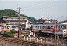 Railbuses parked in front of the roundhouse