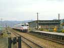 A Kiha-58 and Kiha 52 train pulls into Araya- Shinmachi