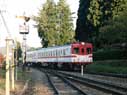 A 2-car train rolls into Otaki-Onsen Station with a Kiha-52 as the lead unit