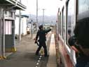 The stationmaster hans the next token to the train driver