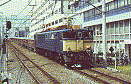 An EF65 hauled freight train on the Nambu line