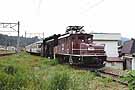 An electric locomotive and a snowplow